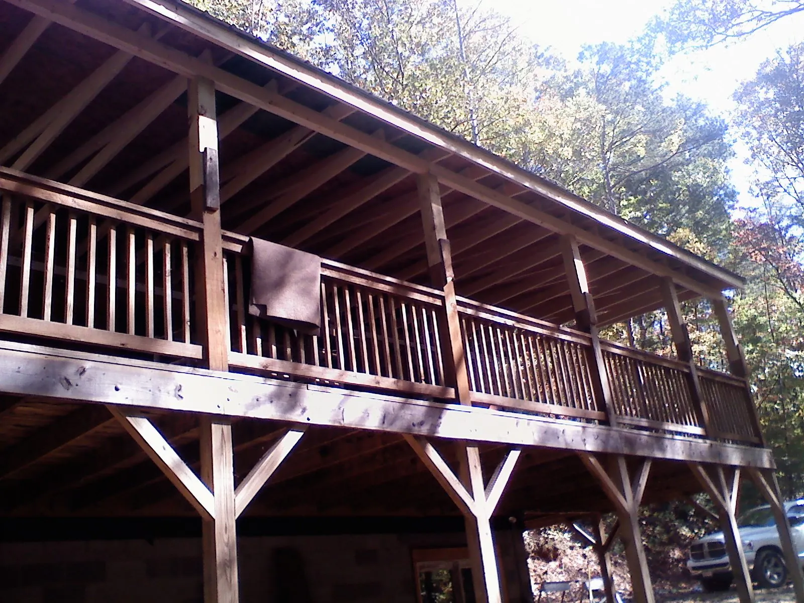 Timber framing under a new elevated porch and deck — Roof Leak Repair in Granada Hills by Roofing Brothers